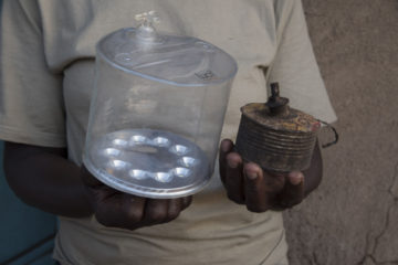 A Luci light next to a typical kerosene light used in homes in Pap Onditi. Luci lights provide clean, safe and renewal light for up to 10 years.